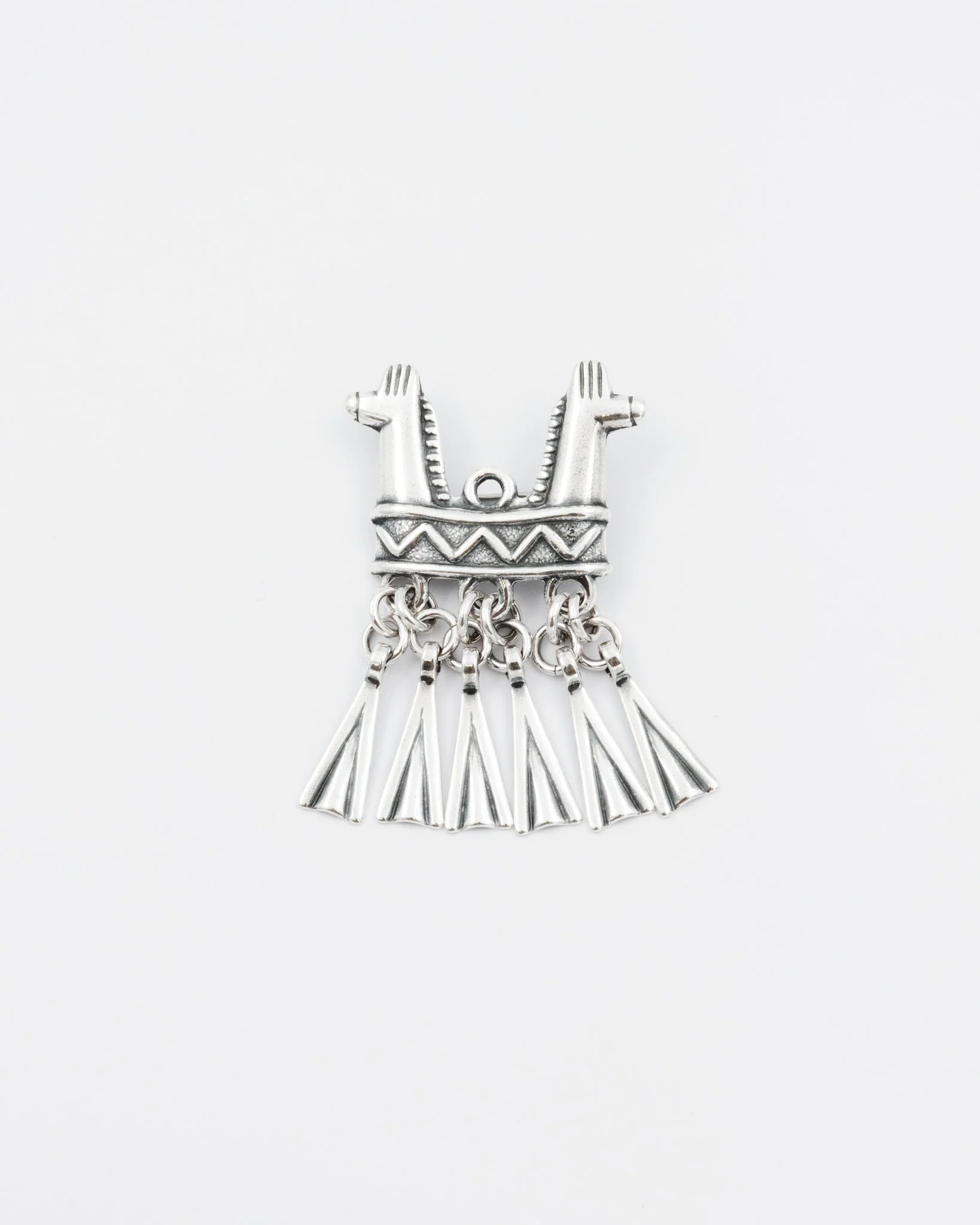Pidetty Kaksipäinen hevonen -rintakoru hopea